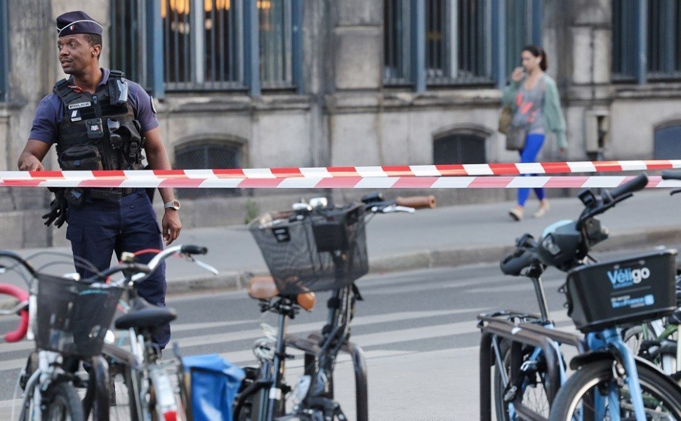 epa10724932 A police officer walks near the venue of the 'One Year to Go Paris 2024' (Dans un An Les Jeux Paris 2024) concert, held amid massive police presence following days of violent protests, in Paris, France, 03 July 2023. Violence broke out across 